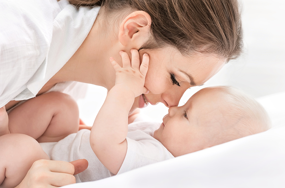 Portrait,Of,Happy,Mother,And,Baby